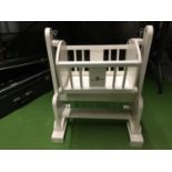 A WHITE PAINTED DOLLS SWINGING CRIB