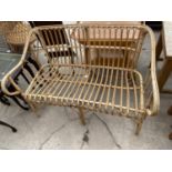 A BAMBOO AND WICKER TWO SEATER SETTEE