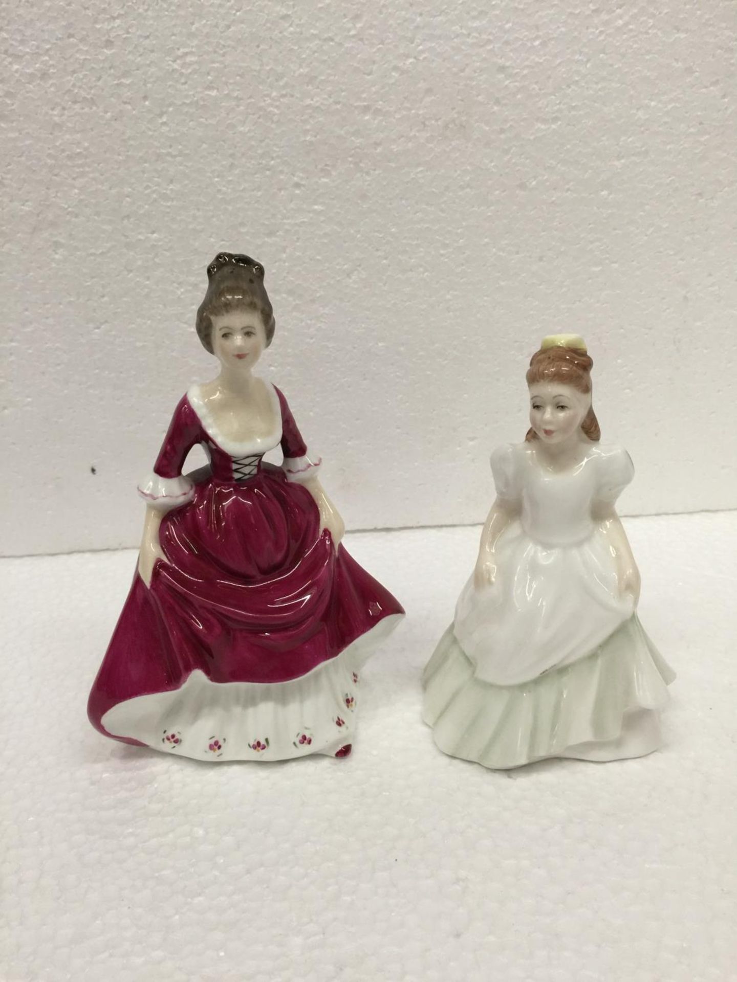 A ROYAL DOULTON SMALL FIGURINE "KERRY" 13 CM TOGETHER WITH A FURTHER FINE BONE CHINA FIGURINE "CARA"