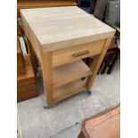 A MODERN BLOCKWORK TOP KITCHEN WORK TABLE ON WHEELS 23.5" SQUARE