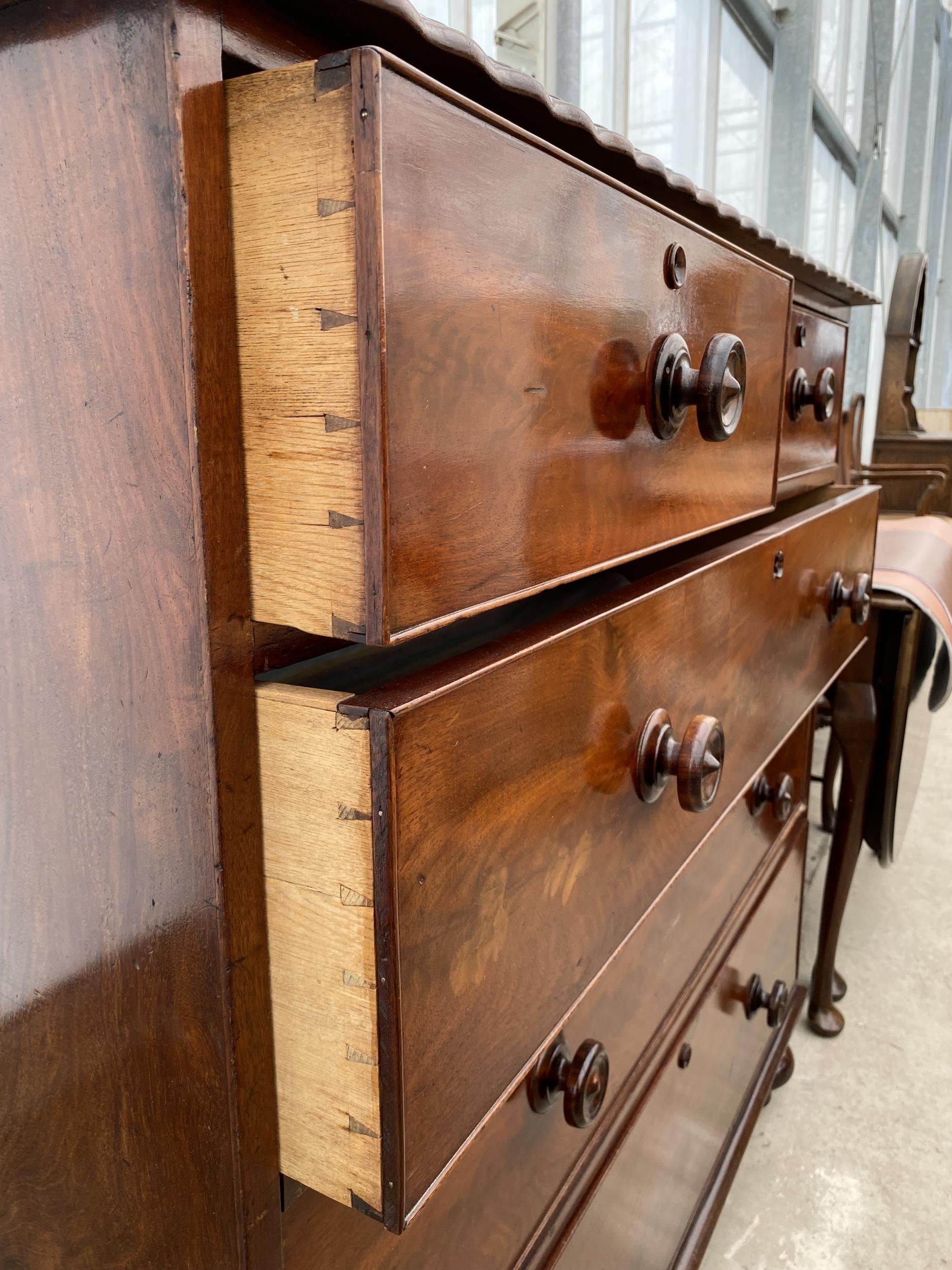 A 19TH CENTURY MAHOGANY CHEST OF TWO SHORT AND THREE LONG GRADUATED DRAWERS WITH PIE CRUST EDGE ON - Image 4 of 6
