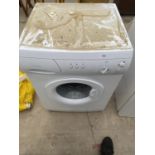 A WHITE FIRST EDITION WASHING MACHINE