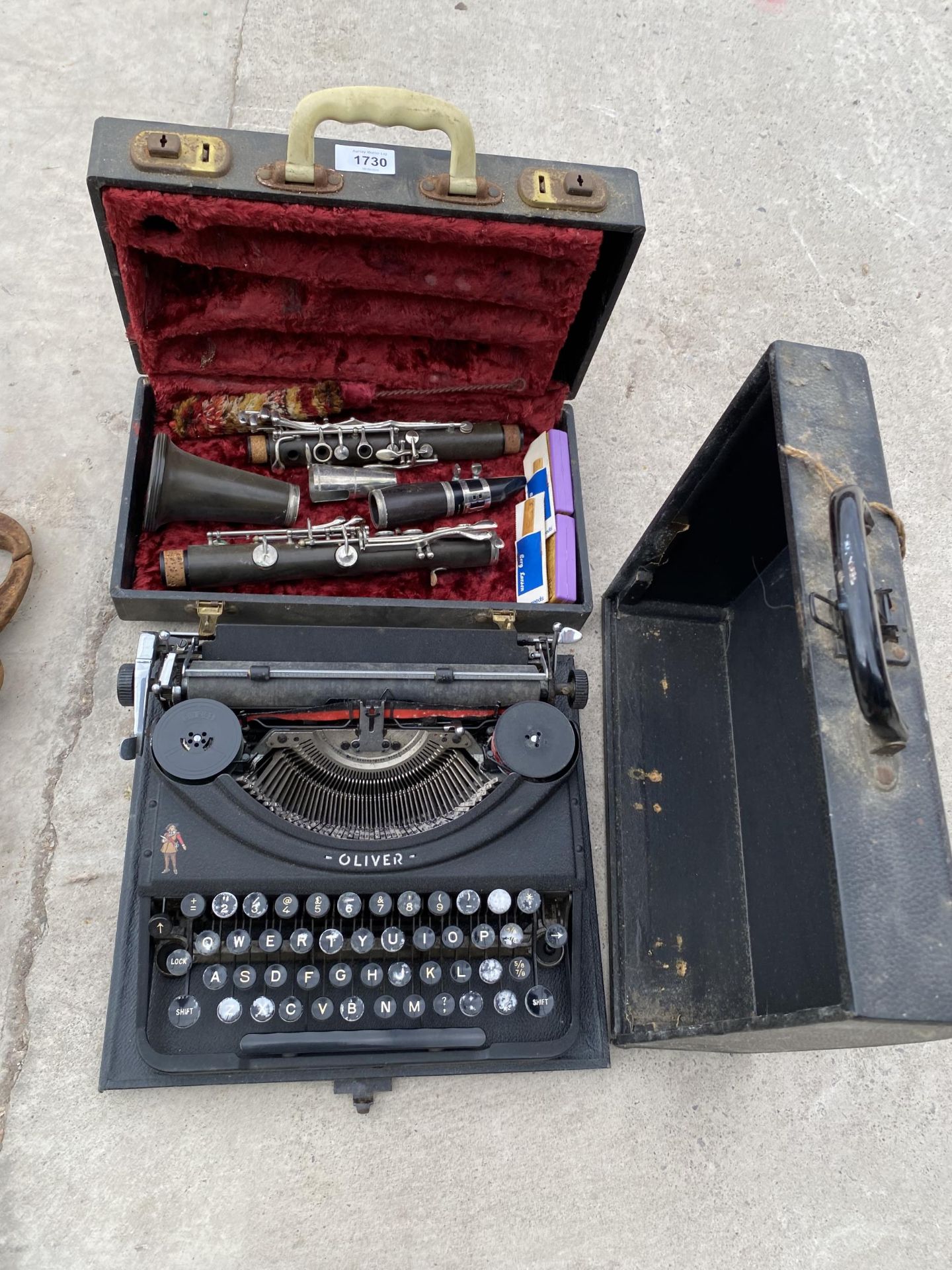 A VINTAGE CASED CLARINET AND AN OLIVER TYPEWRITER