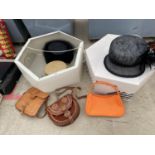 AN ASSORTMENT OF LADIES HANDBAGS AND HATS