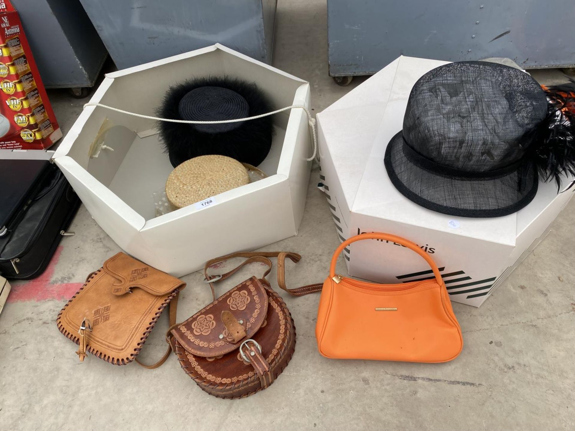 AN ASSORTMENT OF LADIES HANDBAGS AND HATS