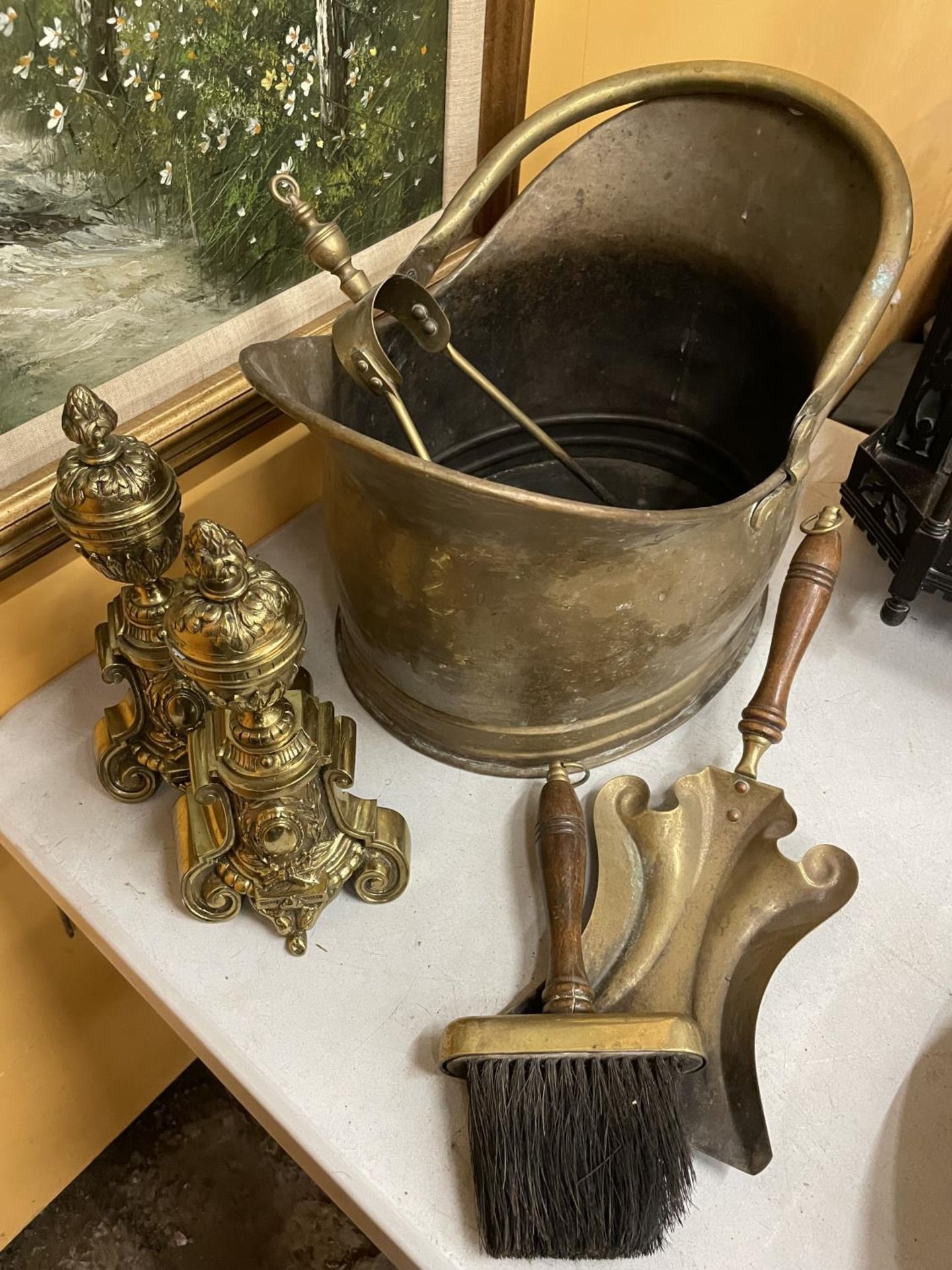 VARIOUS BRASS ITEMS TO INCLUDE A LARGE COAL BUCKET, UNUSUAL SHOVEL, BRUSH, TONGS AND FIRE DOGS