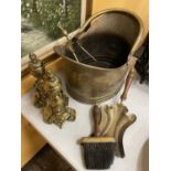 VARIOUS BRASS ITEMS TO INCLUDE A LARGE COAL BUCKET, UNUSUAL SHOVEL, BRUSH, TONGS AND FIRE DOGS