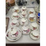 A QUANTITY OF CHINA CUPS, PLATES AND SAUCERS TO INCLUDE ROYAL ALBERT 'PRARIE ROSE', SHERIDAN, ETC