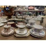 A QUANTITY OF CHINA TO INCLUDE TRIOS - PARAGON 'COUNTRY LANE', ETC PLUS SUGAR BOWL AND CREAM JUGS