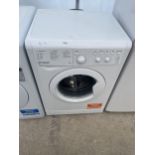 A WHITE INDESIT 7KG WASHING MACHINE BELIEVED IN WORKING ORDER BUT NO WARRANTY