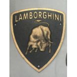 A CAST SHIELD SHAPED LAMBORGHINI SIGN 19CM X 22CM