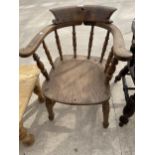 A VICTORIAN ELM AND BEECH CAPTAINS CHAIR WITH TURNED LEGS AND UPRIGHTS