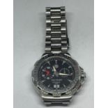 A TAG HEUER FORMULA 1 PROFESSIONAL 200M WRIST WATCH SEEN WORKING BUT NO WARRANTY