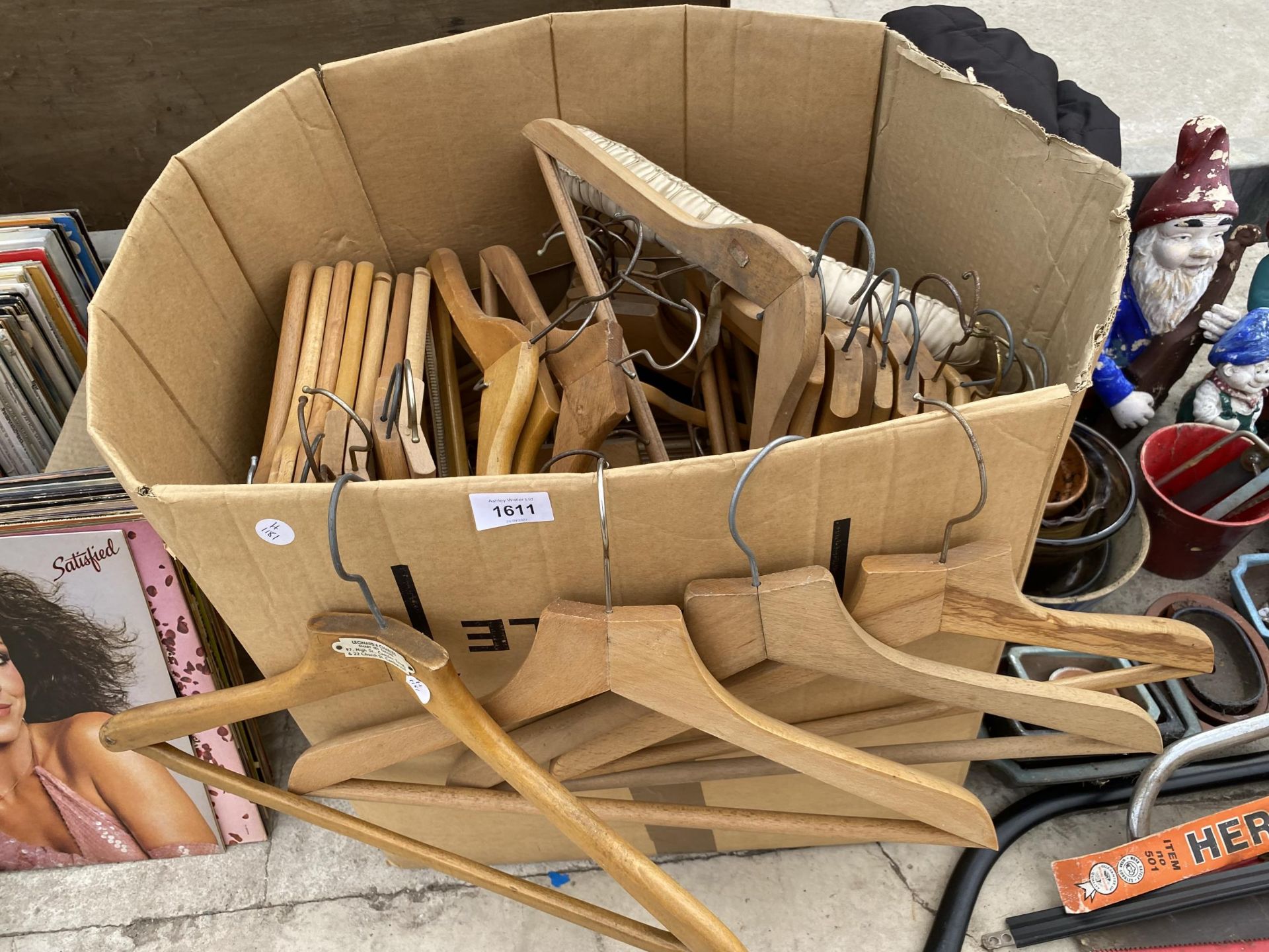 A LARGE QUANTITY OF WOODEN COAT HANGERS