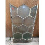 A VINTAGE METAL HONEYCOMB GLAZED WINDOW FRAME