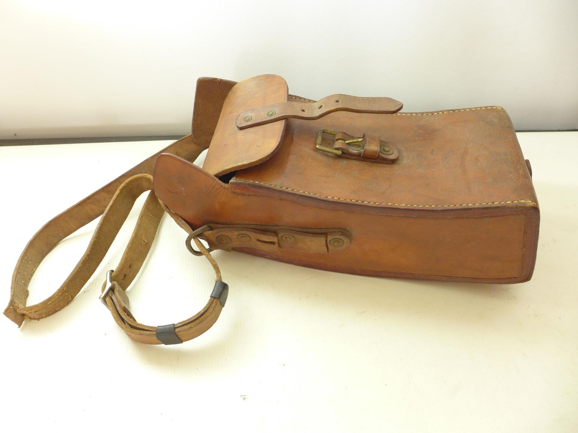 A MILITARY LEATHER MAGAZINE HOLDER, WITH FOUR COMPARTMENTS, LENGTH 37CM