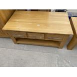 A MODERN OAK SIX DRAWER COFFEE TABLE, 43X23"