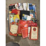 A LARGE QUANTITY OF VINTAGE CAR MANUALS AND ORDANANCE SURVEY MAPS ETC