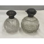 TWO CUT GLASS BOTTLES WITH HALLMARKED SILVER TOPS ONE BIRMINGHAM ONE CHESTER