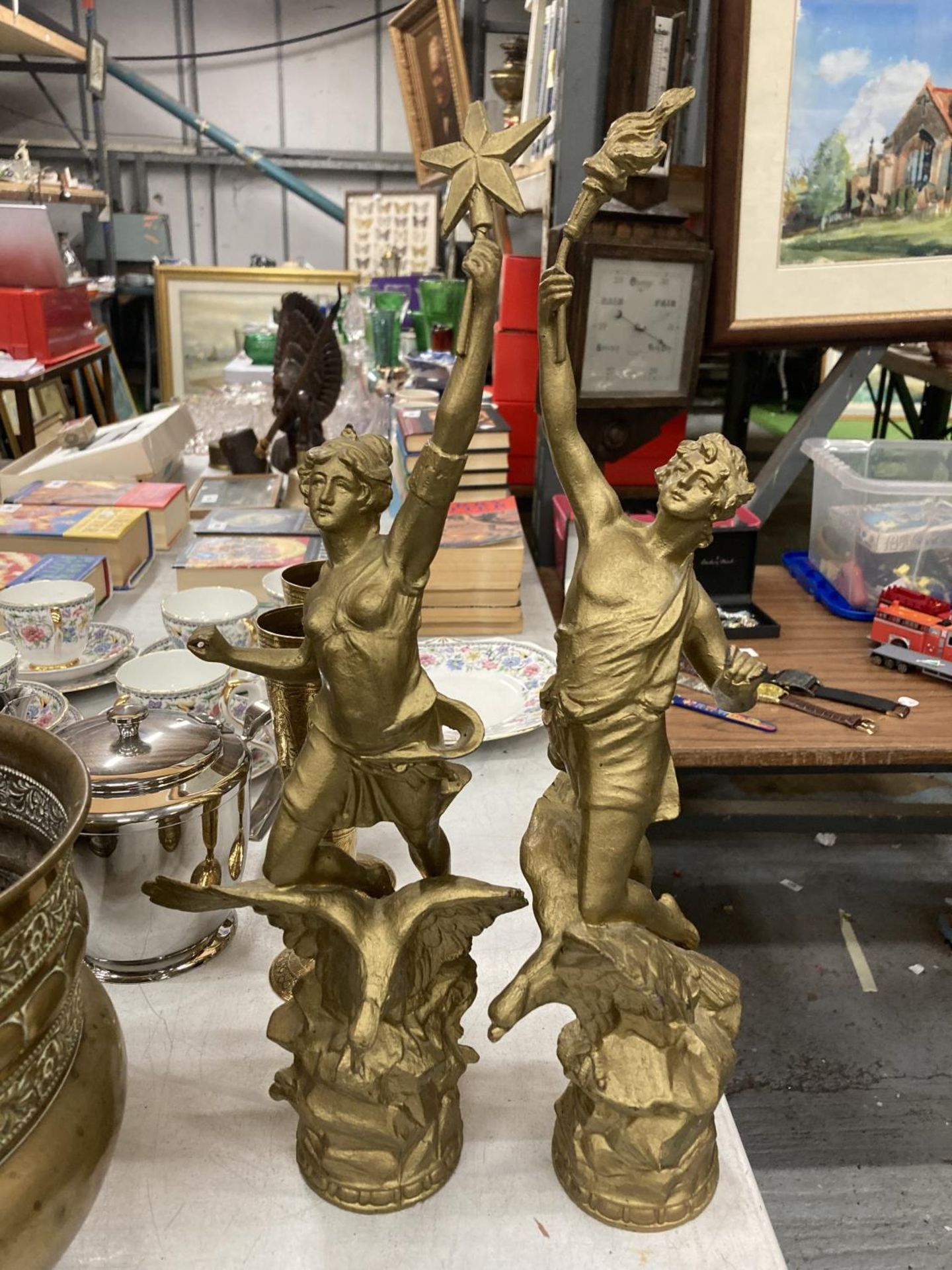 TWO YELLOW METAL STATUES OF CLASSICAL FIGURES