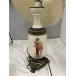 A VINTAGE CERAMIC TABLE LAMP WITH A LADY DECORATION
