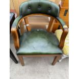 A MODERN FAUX GREEN LEATHER ELBOW CHAIR