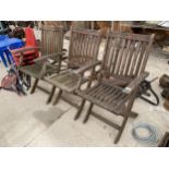 THREE TEAK FOLDING GARDEN CHAIRS