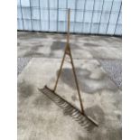 A LARGE VINTAGE WOODEN NORFOLK DRAG RAKE