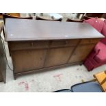 A STAG MINSTREL SIDEBOARD WITH THREE DRAWERS AND THREE CUPBOARDS, 55" WIDE
