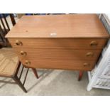 A RETRO TEAK CHEST OF THREE DRAWERS, 29.5" WIDE