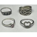 FOUR MARKED SILVER RINGS