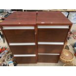 A PAIR OF WOODEN THREE DRAWER FILING CABINETS