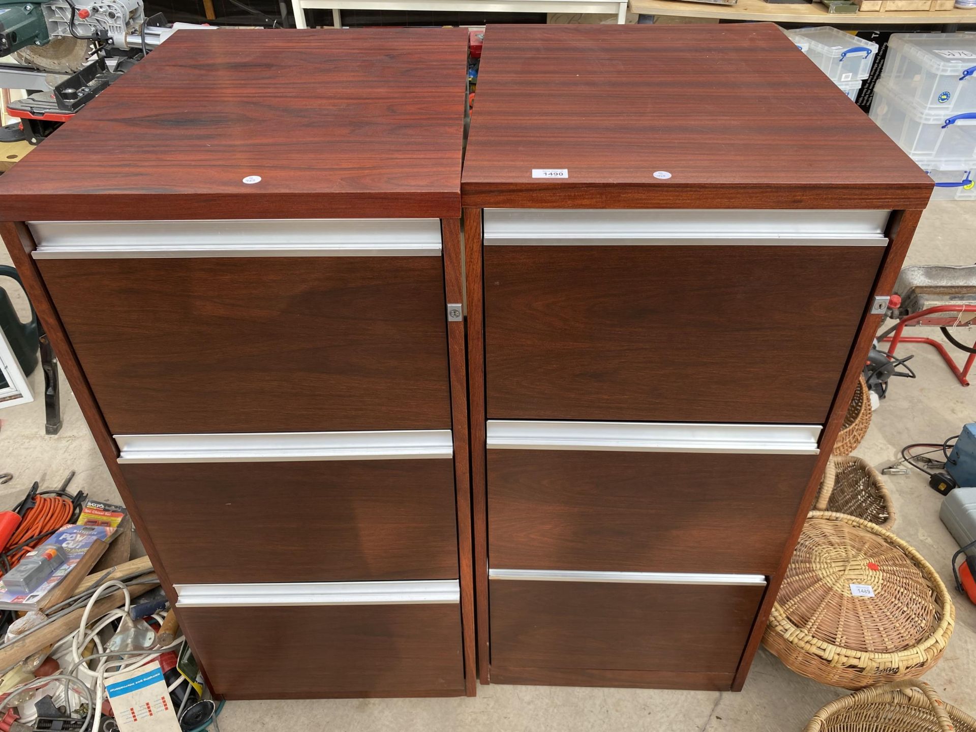 A PAIR OF WOODEN THREE DRAWER FILING CABINETS