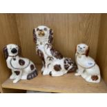 THREE CERAMIC STAFFORDSHIRE SPANIELS