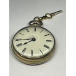 AN EARLY GOLD PLATED POCKET WATCH WITH KEY