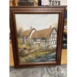 A FRAMED OIL ON CANVAS OF A COUNTRY COTTAGE SIGNED PR FREEMAN