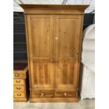 A MODERN PINE TWO DOOR WARDROBE WITH TWO DRAWER TO THE BASE, 47" WIDE