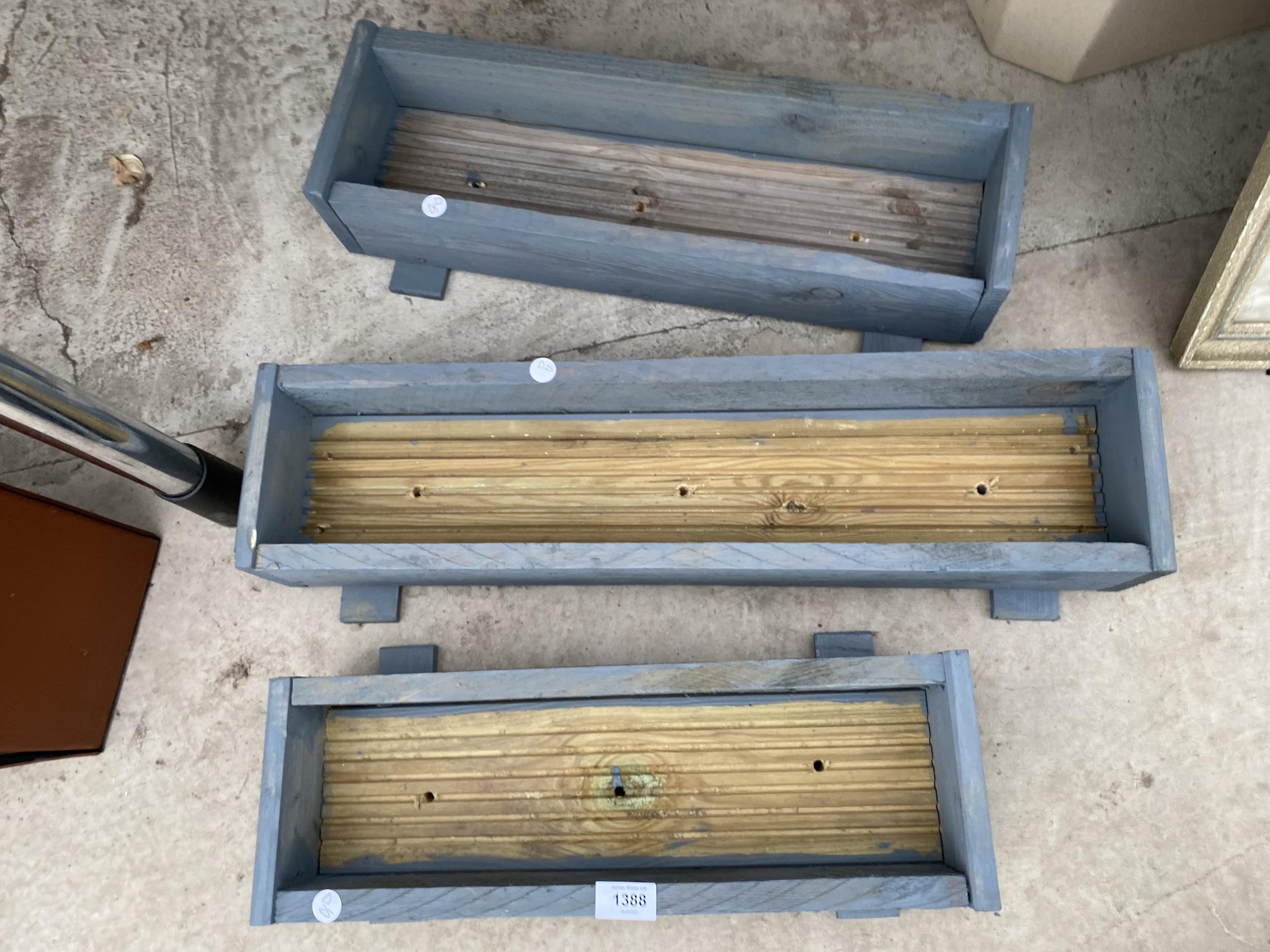 THREE GRADUATED WOODEN TROUGH PLANTERS - Image 2 of 2