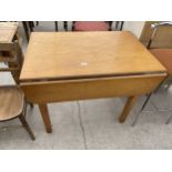 A MID 20TH CENTURY DROP LEAF TABLE WITH CANTED CORNERS