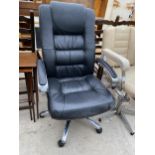 A MODERN FAUX BLACK LEATHER SWIVEL CHAIR ON A POLISHED CHROME FRAME