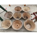EIGHT LARGE MATCHING TERRACOTTA BOWL PLANTERS