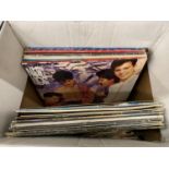 A QUANTITY OF 1950'S TO 1980'S LP'S AND SINGLE RECORDS TO INCLUDE ROLLING STONES, STATUS QUO,