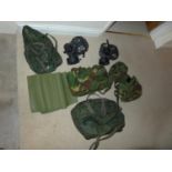 TWO MILITARY GAS MASKS AND CAMOUFLAGED BAGS, FURTHER BAG ETC