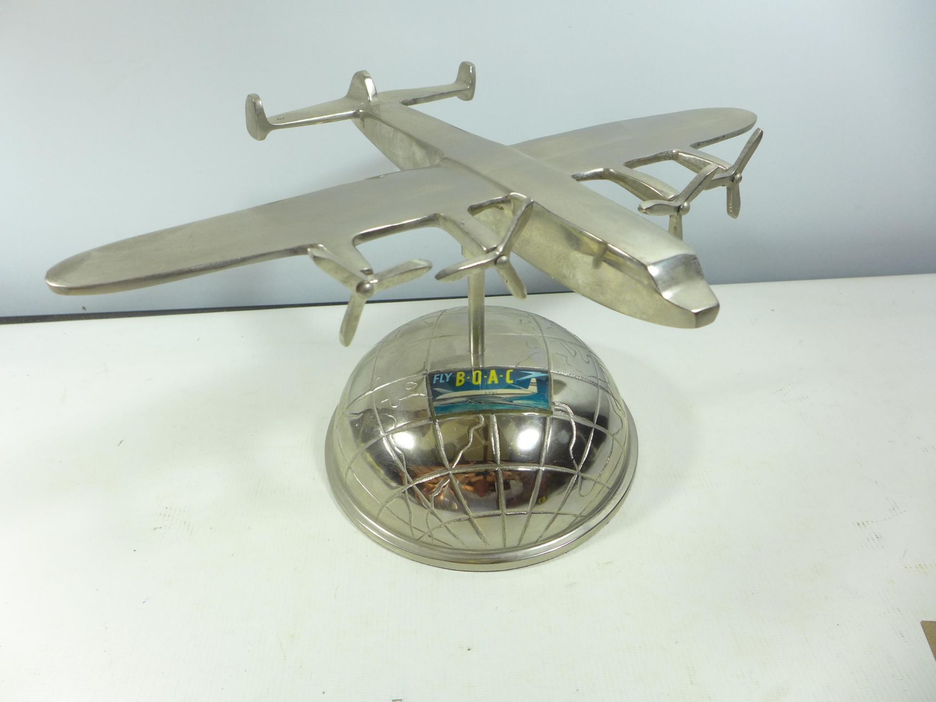 A CHROME PLATED BOAC PLANE ON STAND, HEIGHT 22CM