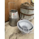 A STAINLESS STEEL MILKING BUCKET AND TWO METAL MILK CHURN SIEVES