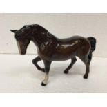 A BESWICK BROWN PRANCING HORSE