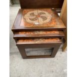 A RETRO NEST OF THREE TABLES WITH TILED TOPS