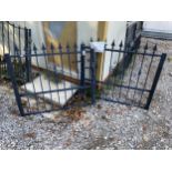 A PAIR OF WROUGHT IRON GARDEN GATES (W:7FT 6" H:3FT 5")