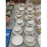 A QUANTITY OF CHINA CUPS, SAUCERS AND PLATES TO INCLUDE ROYAL ALBERT 'LADY CARLYLE', ETC