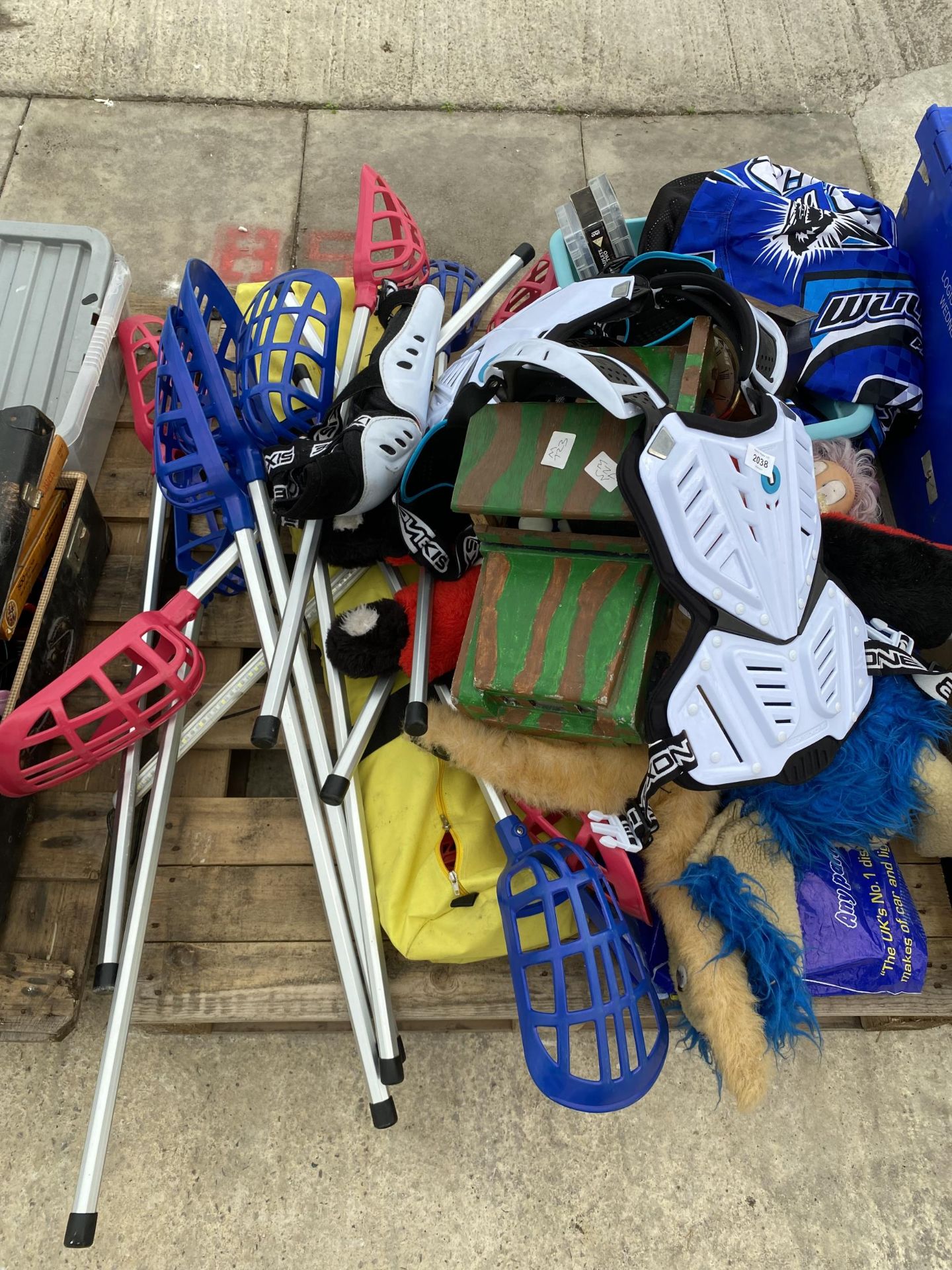 AN ASSORTMENT OF SPORTS EQUIPMENT